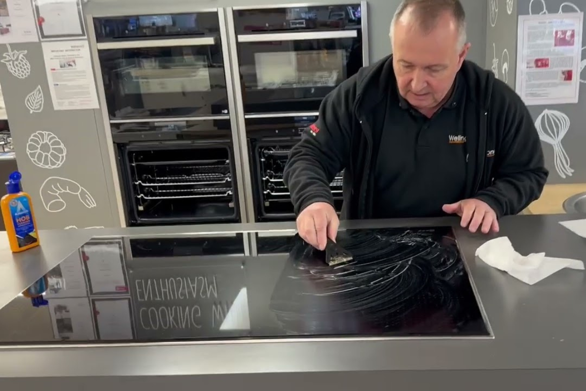 Cleaning off white bubbles on an induction stove