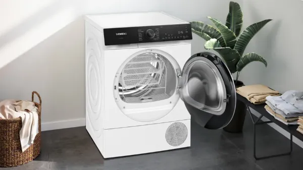 Siemens WQ46H2D9GB Heat Pump Tumble Dryer in White_angled